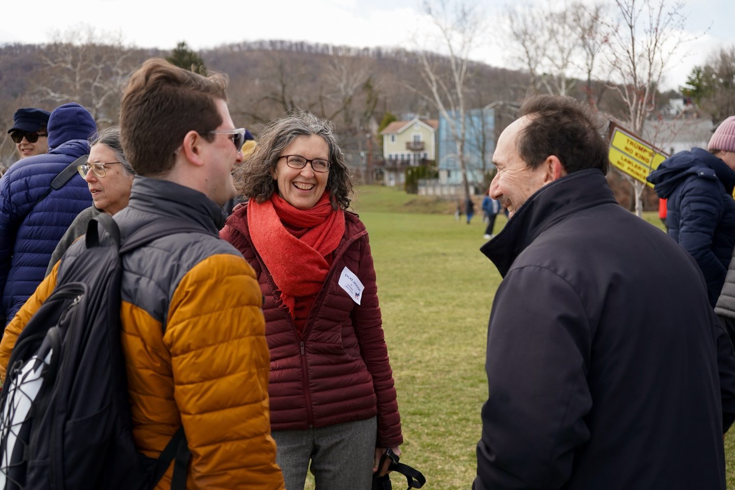 Sylke Jackson greeting neighbors at a community gathering
