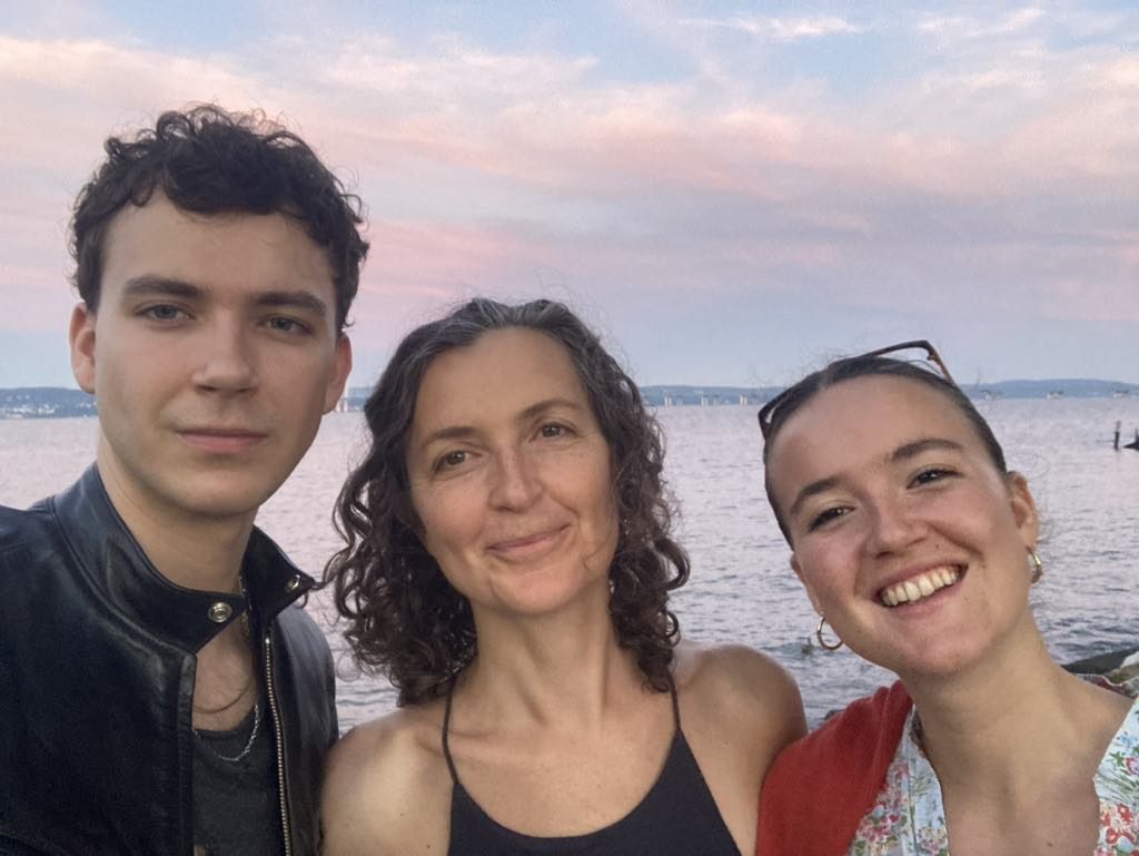 Sylke Jackson with her two children by the Hudson River
